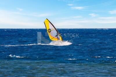 Guy enjoys skiing on the waters