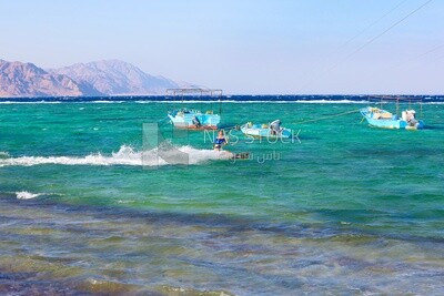 Young man enjoying skiing in the waters
