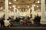 View from the back of the worshipers in the mosque, performing the obligatory prayer inside the mosque, reverence in prayer, performing the obligatory prayer in the mosque, worship and getting closer