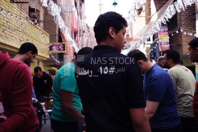 Photo of a man organizing the event of iftar Matareya, Ramadan Kareem, preparing their iftar