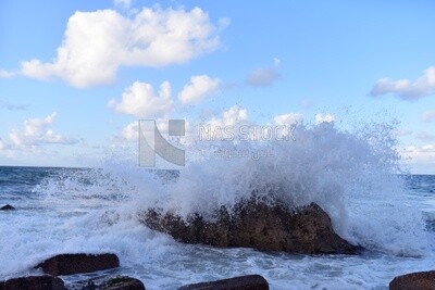 Sea waves hitting the rocks