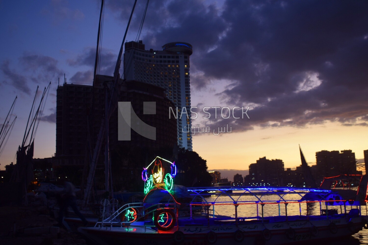 Picture showing the Nile boats mooring next to the Grand Nile Hotel