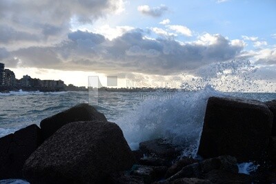 Sea waves hitting the rocks of Alexandria Beach