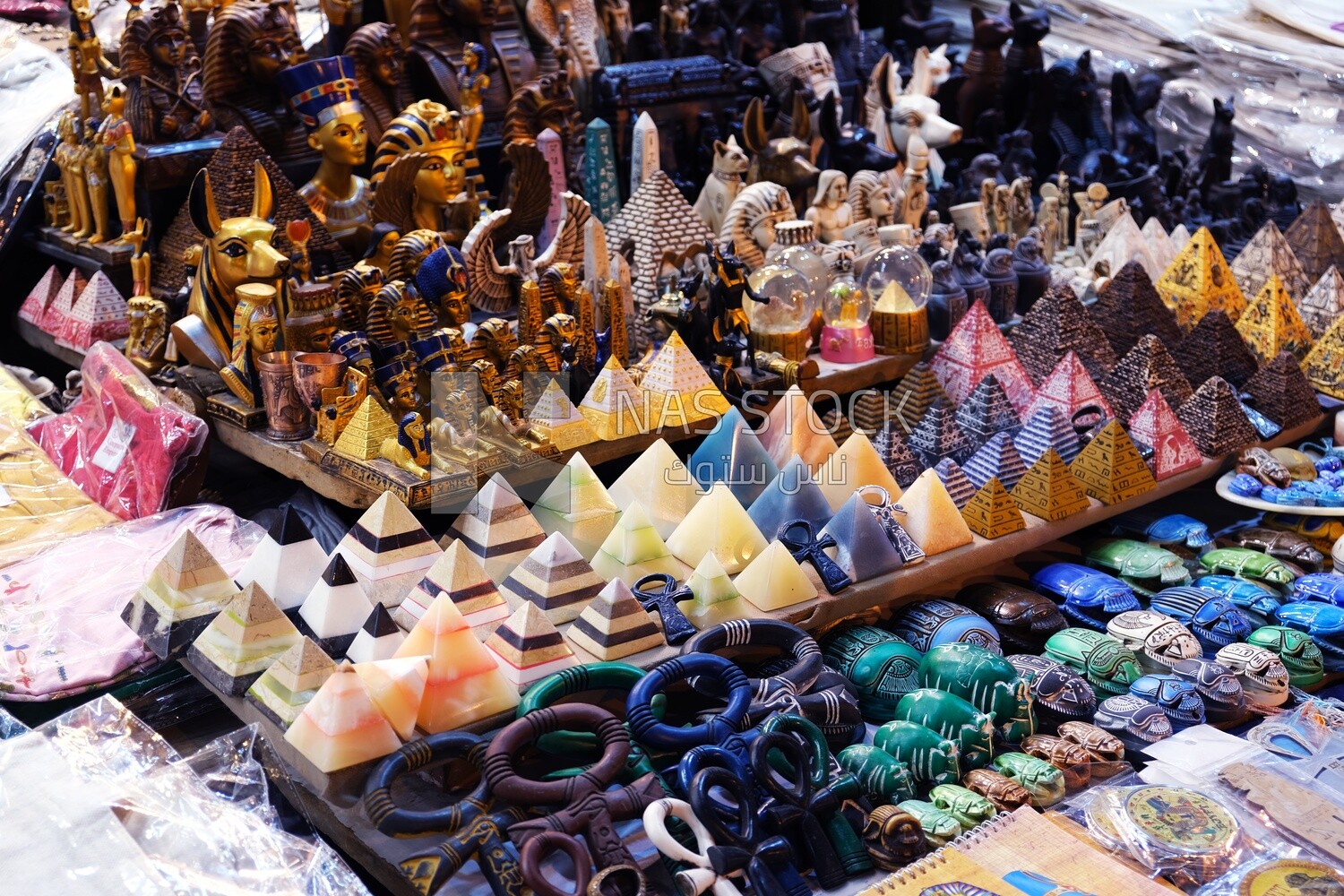 Different Egyptian souvenirs for sale in a street shop, street, work