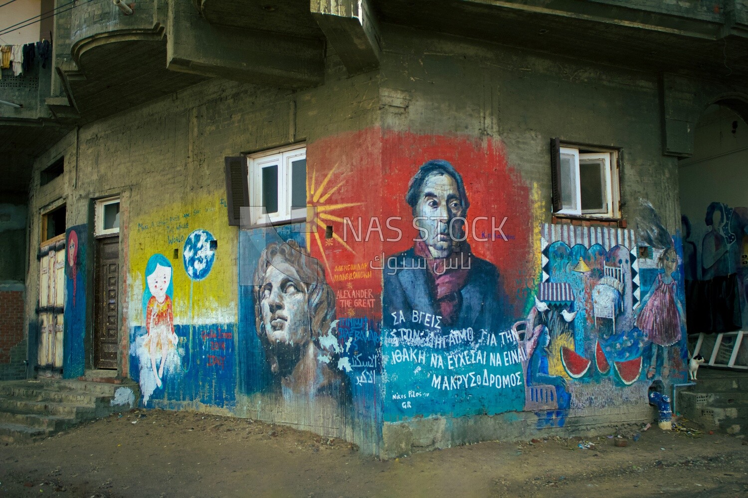 Old house with a group of pictures painted on its walls