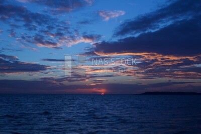 Sunset with the sea in the city of Burullus
