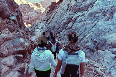 Tourists descending to the foot of the mountain