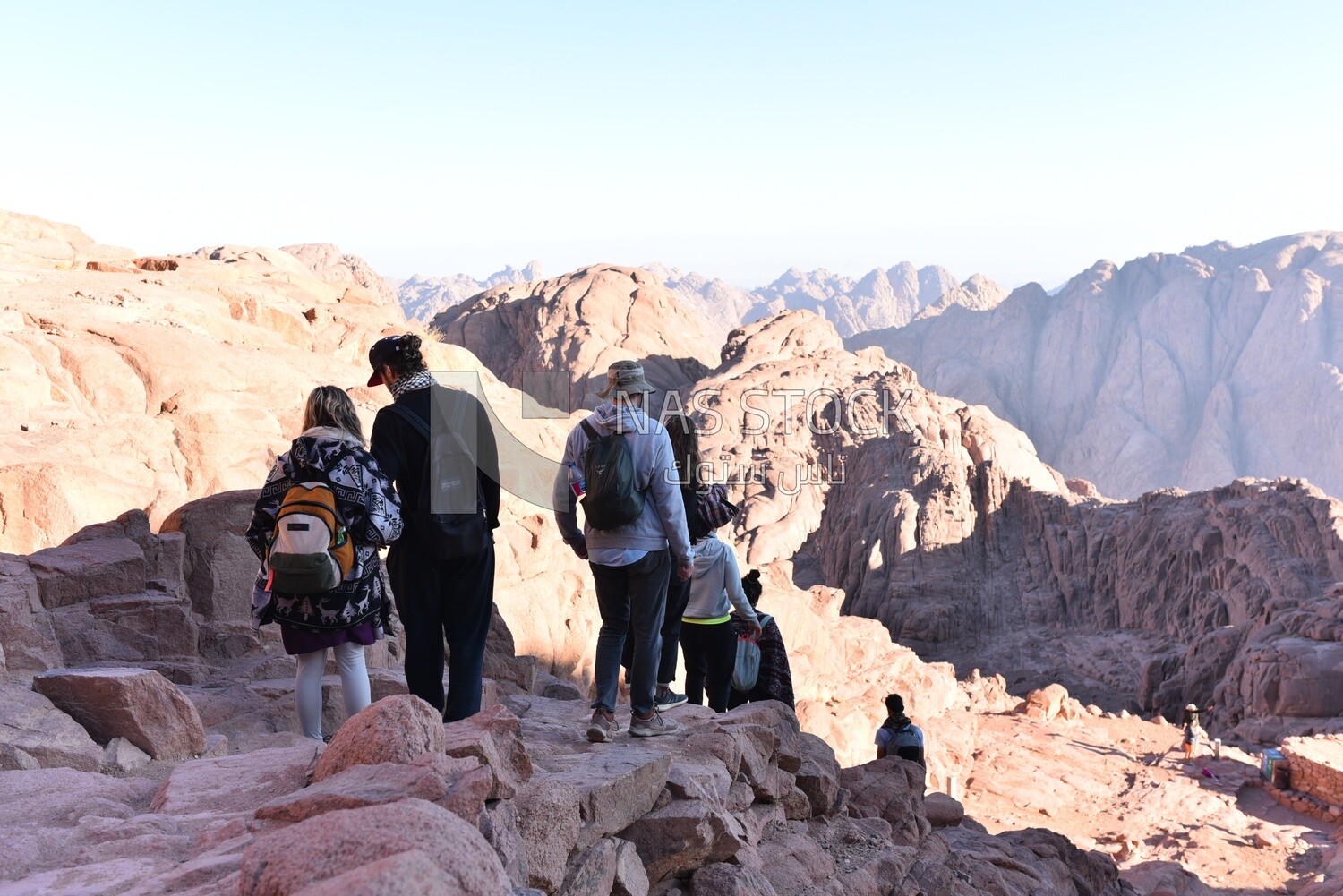 Tourists descending to the foot of the mountain