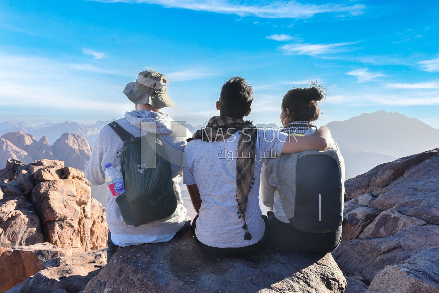 Group of friends enjoying the sunset view