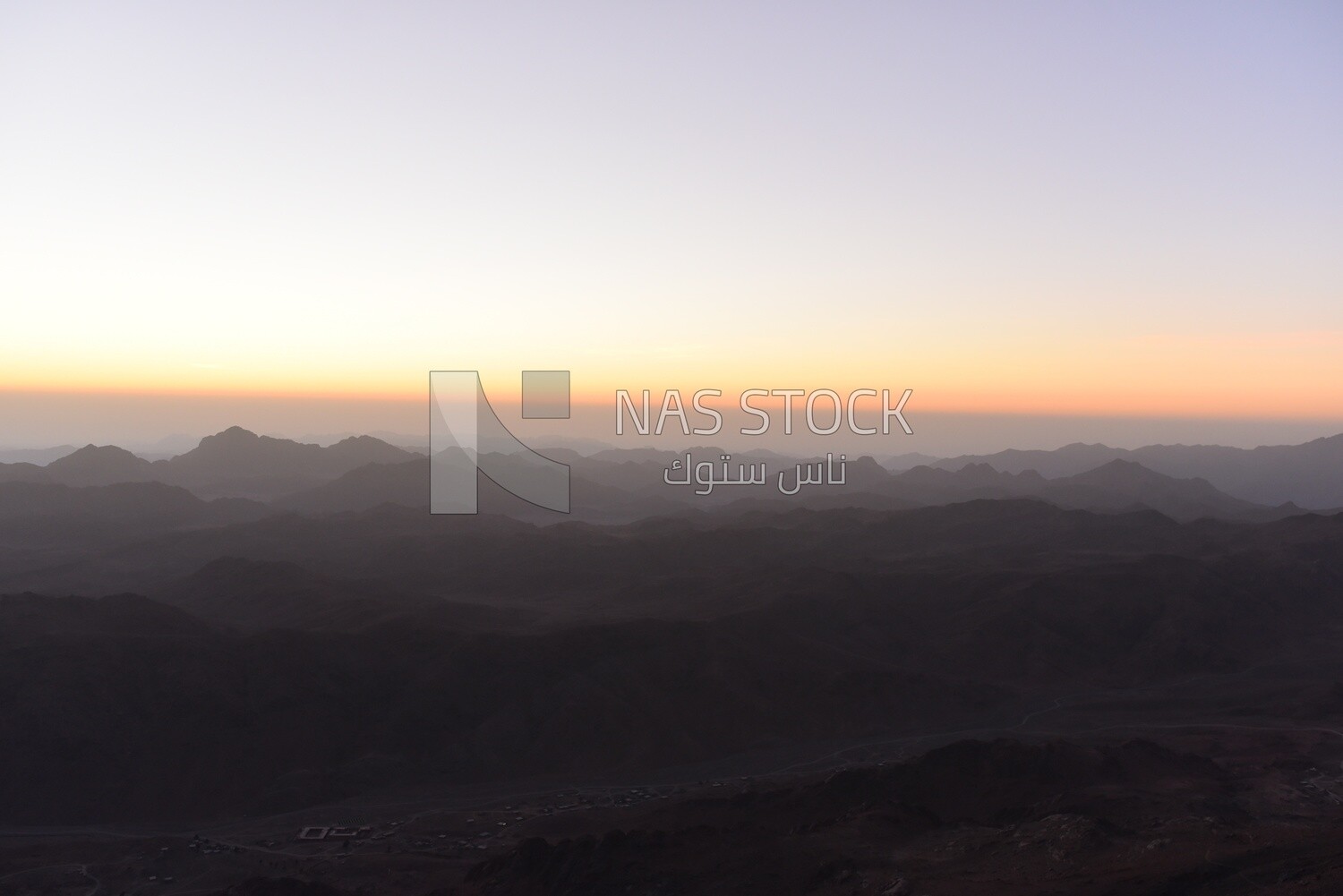 Orange to purple gradient sky over the desert of the Sinai Peninsula, Egypt