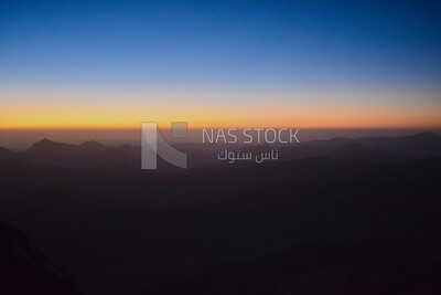 Orange to purple gradient sky over the desert of the Sinai Peninsula, Egypt