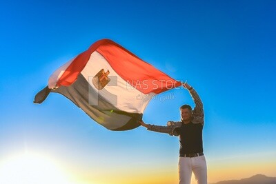 Man raises the Egyptian flag