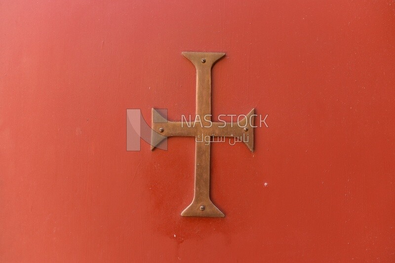 Cross pattern on a red wall