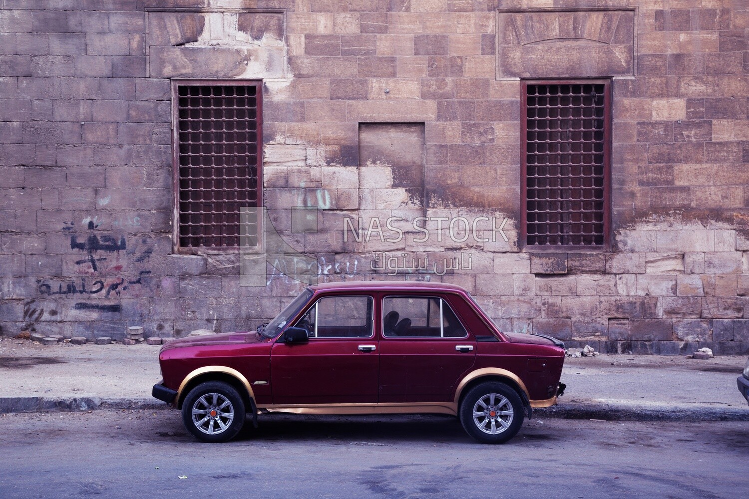 Fiat 128 parked in a Cairo neighborhood