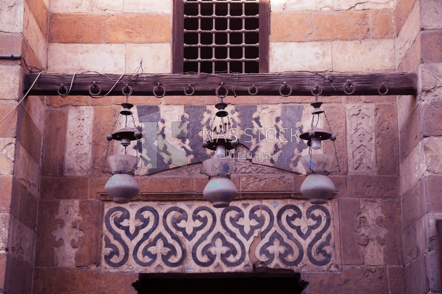 Mosque lamps hanging in an old Islamic mosque of heritage