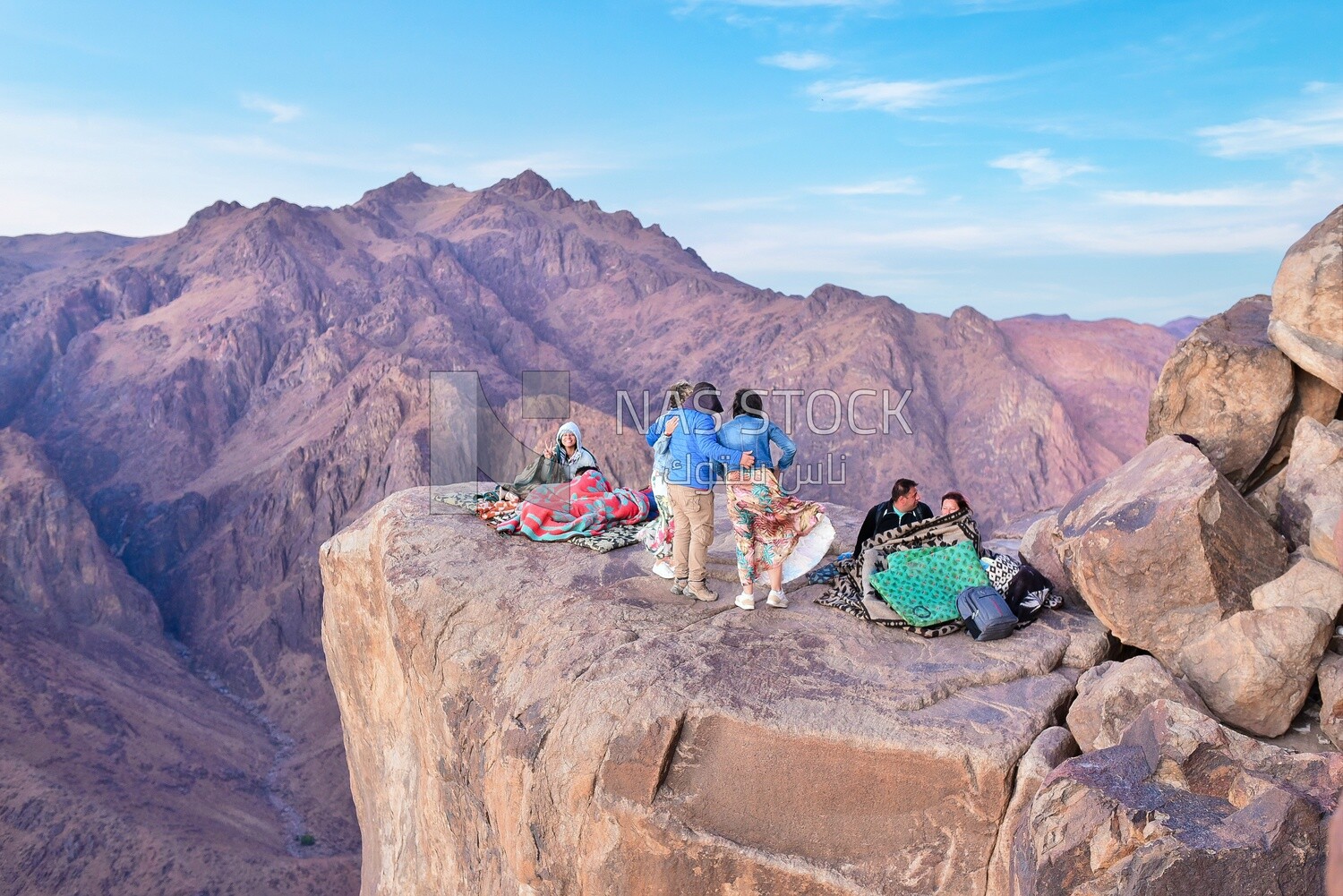 Group of tourists camping at the top of a mountain in Sinai, Egypt