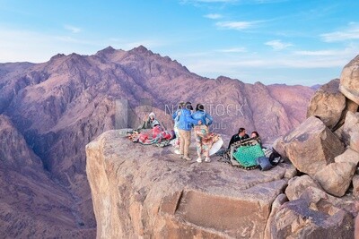 Group of tourists camping at the top of a mountain in Sinai, Egypt