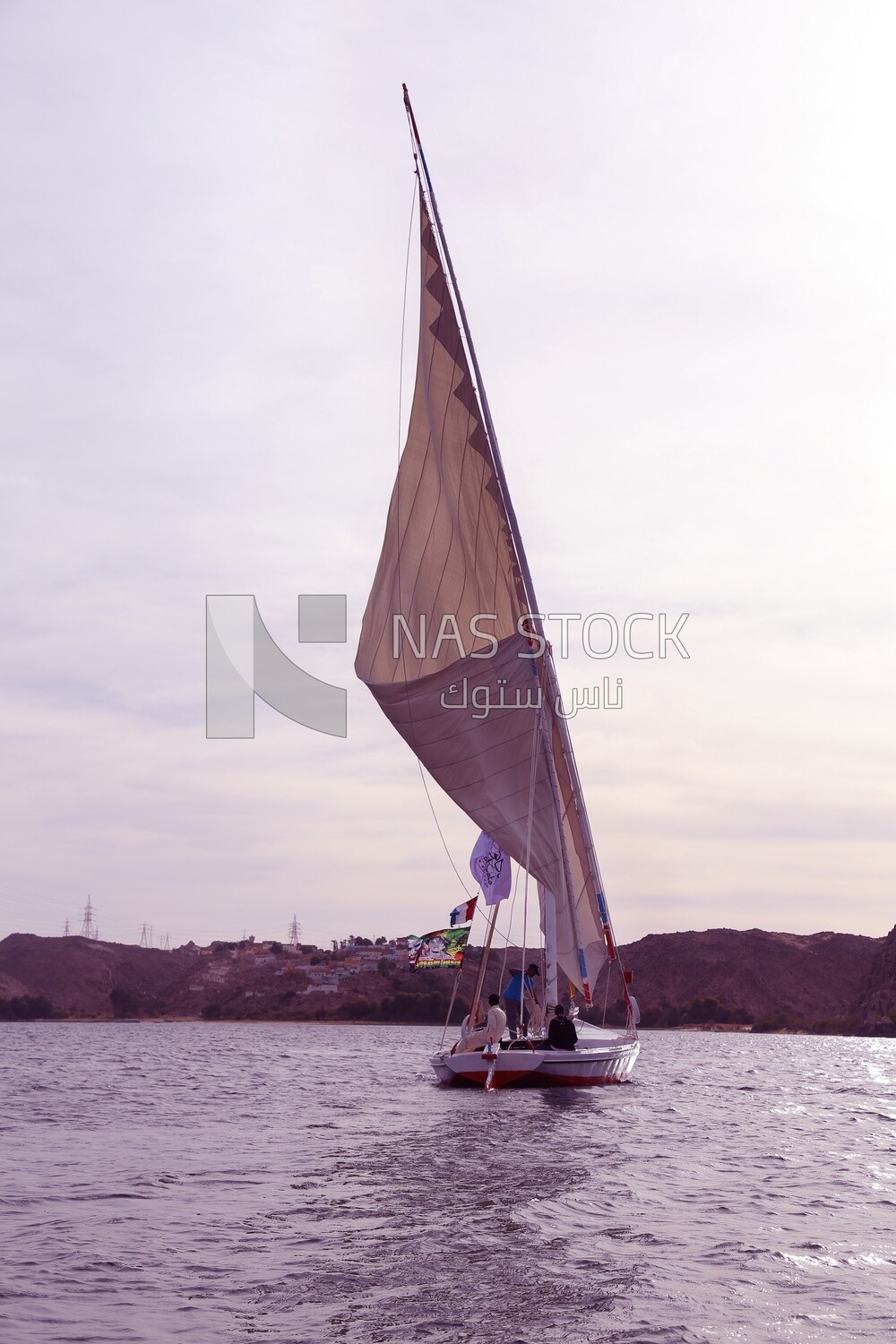 Sailboat sailing on the Nile River in Aswan, Egypt.