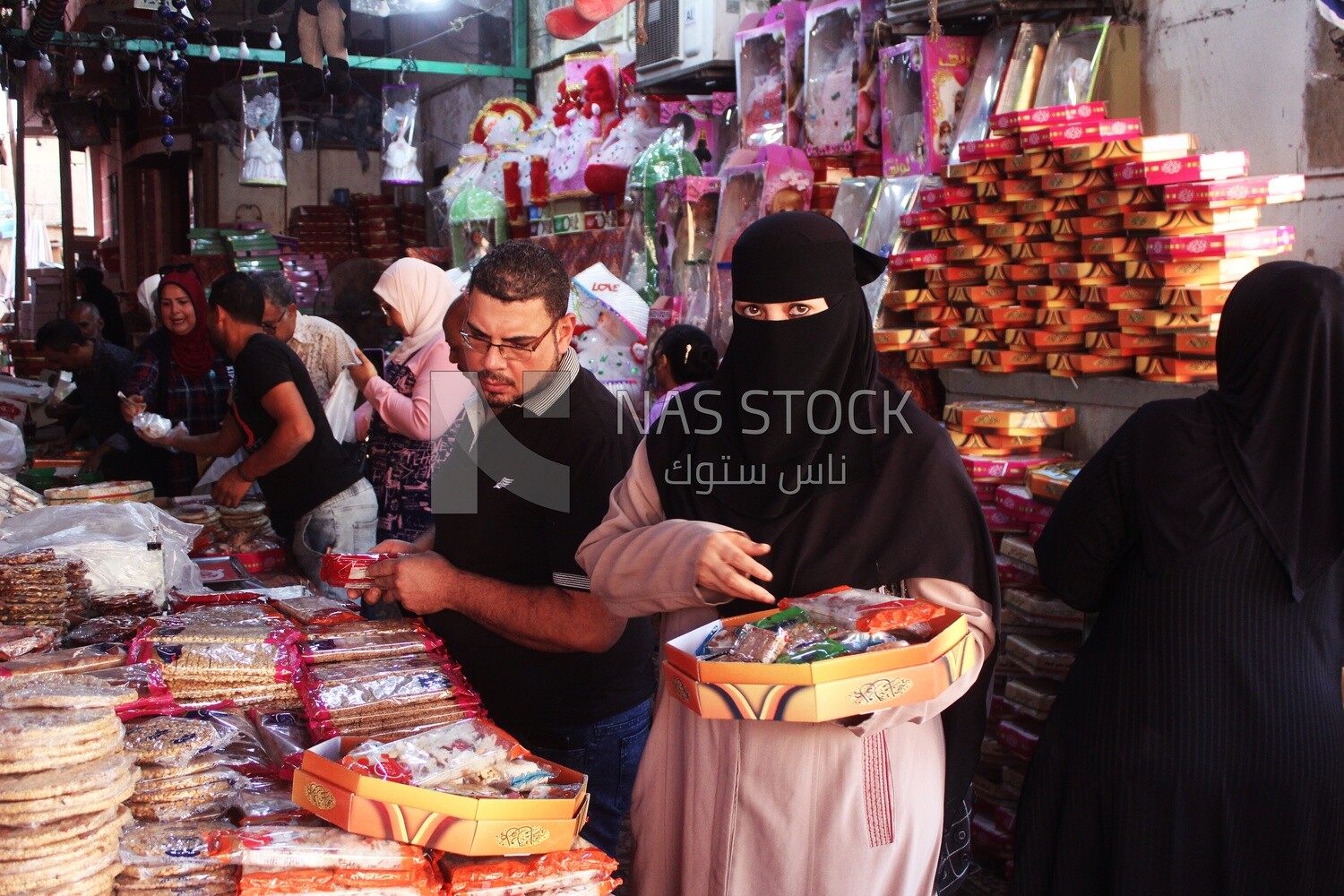 View of a People in the street buying the candies of the prophet Muhammad&#39;s birth