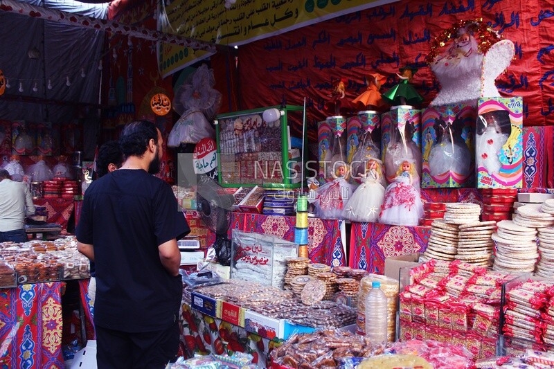 View of a People in the street buying the candies of the prophet Muhammad&#39;s birth