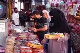 View of a People in the street buying the candies of the prophet Muhammad&#39;s birth