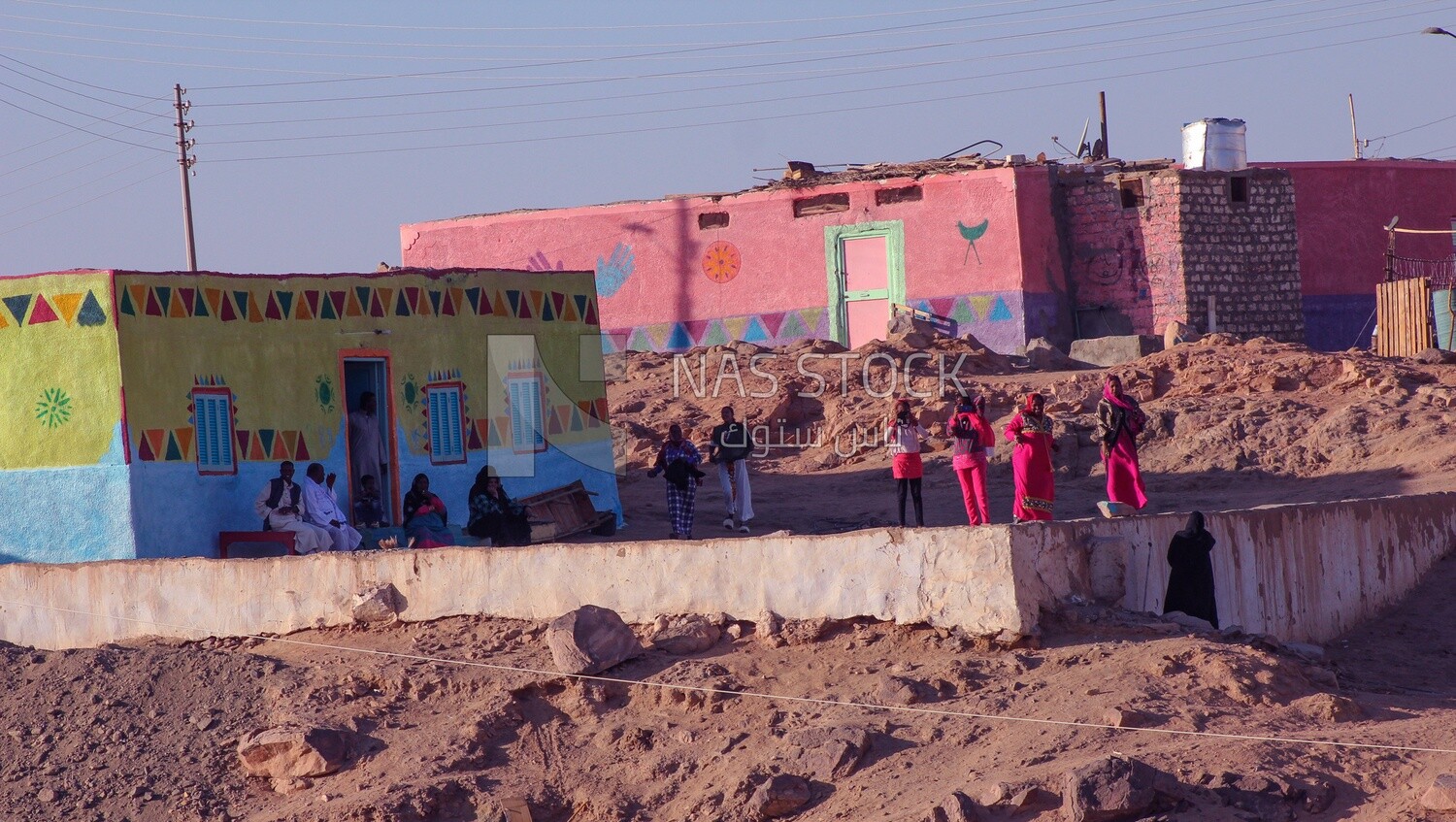 Residents of Aswan and the colorful houses,Egypt