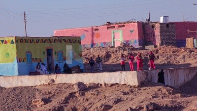 Residents of Aswan and the colorful houses,Egypt