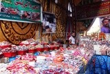 Man standing selling the candies of the prophet Muhammad&#39;s birth in the street