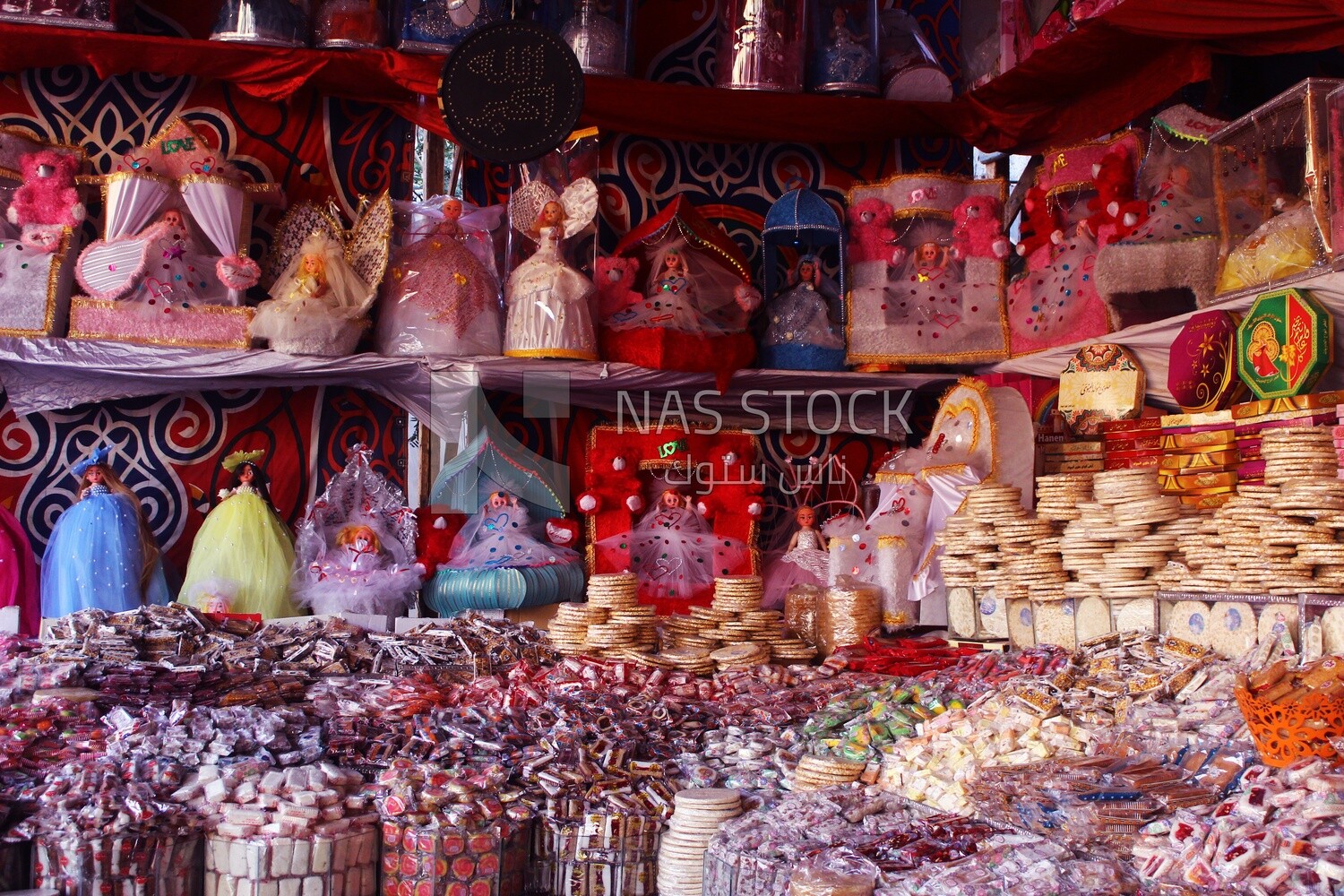 View of Collection of Arabian Sweet Candies with Nuts, Peanuts, Hazelnuts, and Pistachios in the Street, Egyptian Desserts of Prophet Muhammad&#39;s Birth Celebration