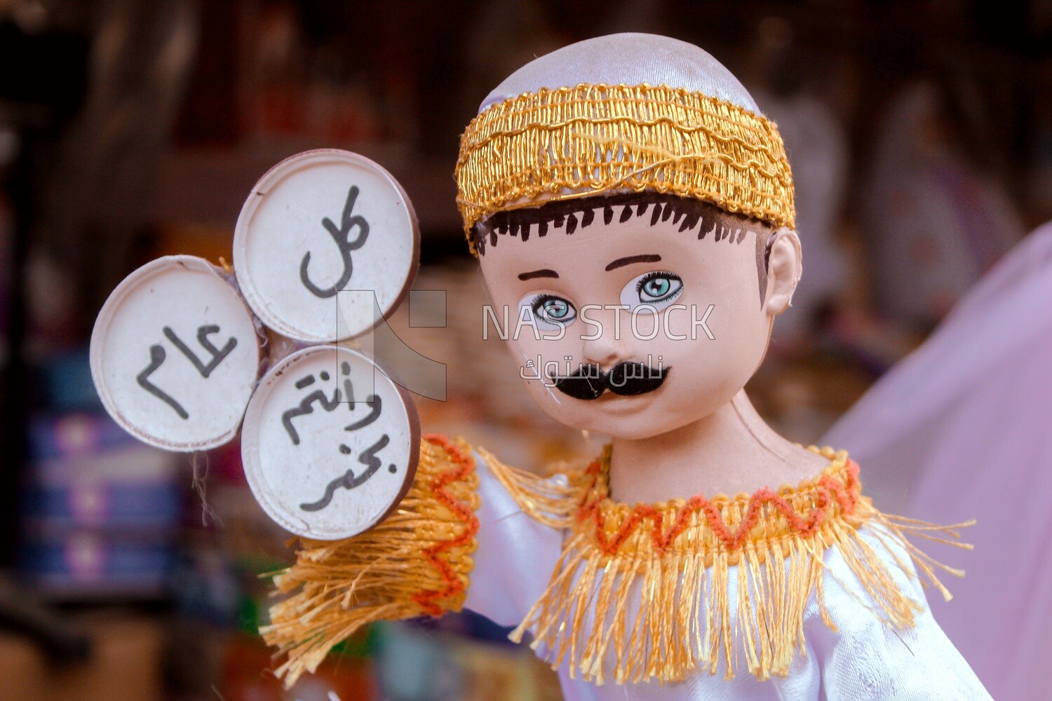 Close up of the Mawlid doll in the street, Egyptian Desserts of Prophet Muhammad&#39;s Birth Celebration