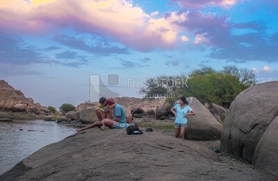 Group of tourists enjoying the beauty of the Nile River ,Aswan City, Egypt