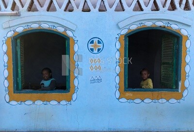 Two Nubian girls standing in the window, Nubia, Egypt