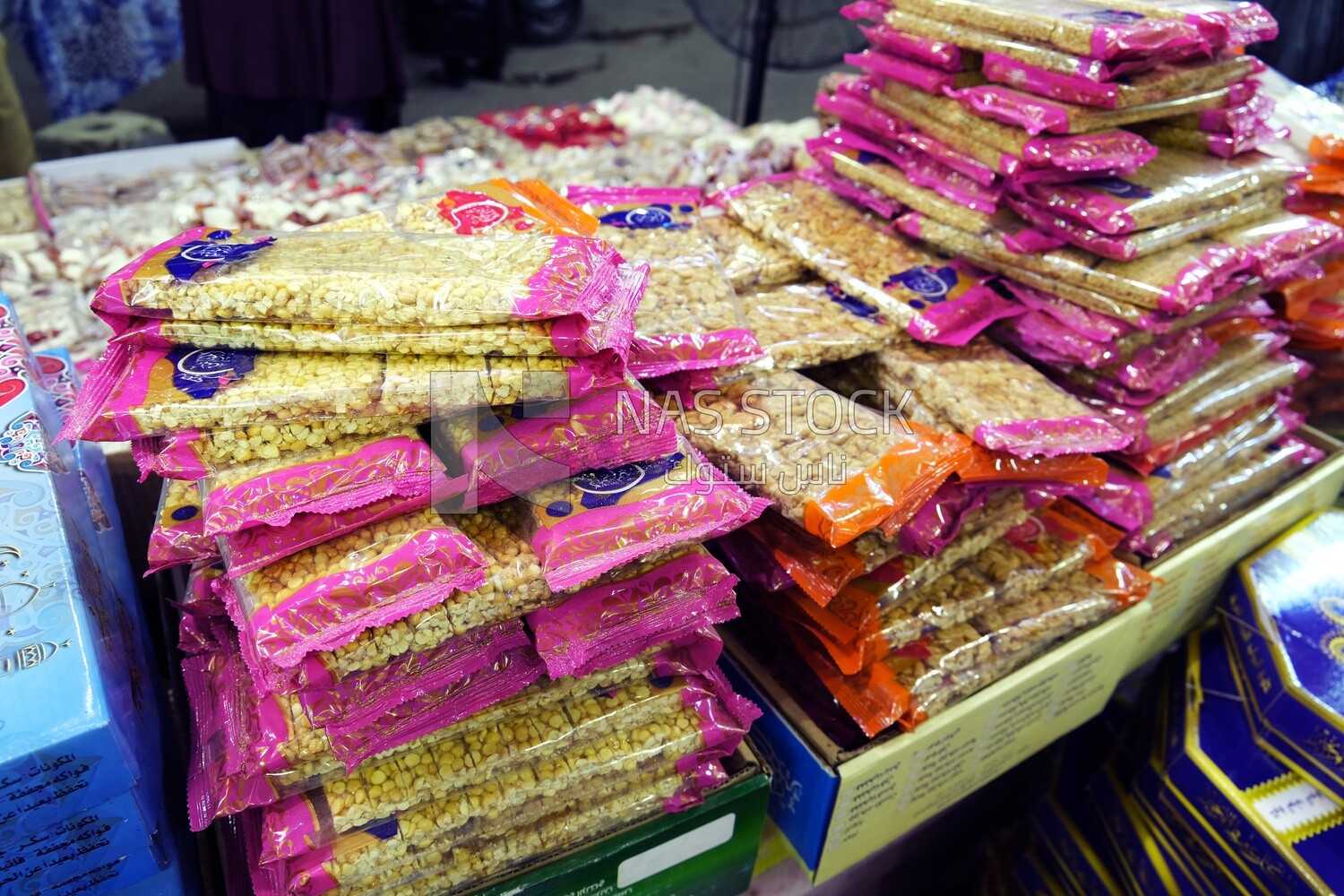 View of Collection of Arabian Sweet Candies with Nuts, Peanuts, Hazelnuts, and Pistachios in the Street, Egyptian Desserts of Prophet Muhammad&#39;s Birth Celebration
