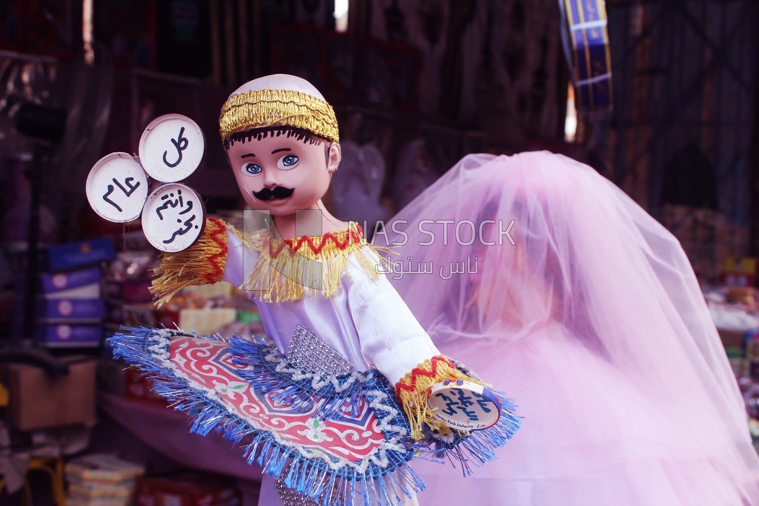 Close up of the Mawlid doll in the street, Egyptian Desserts of Prophet Muhammad&#39;s Birth Celebration