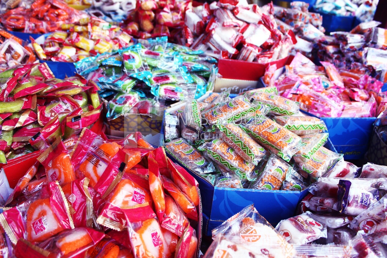 View of Collection of Arabian Sweet Candies with Nuts, Peanuts, Hazelnuts, and Pistachios in the Street, Egyptian Desserts of Prophet Muhammad&#39;s Birth Celebration