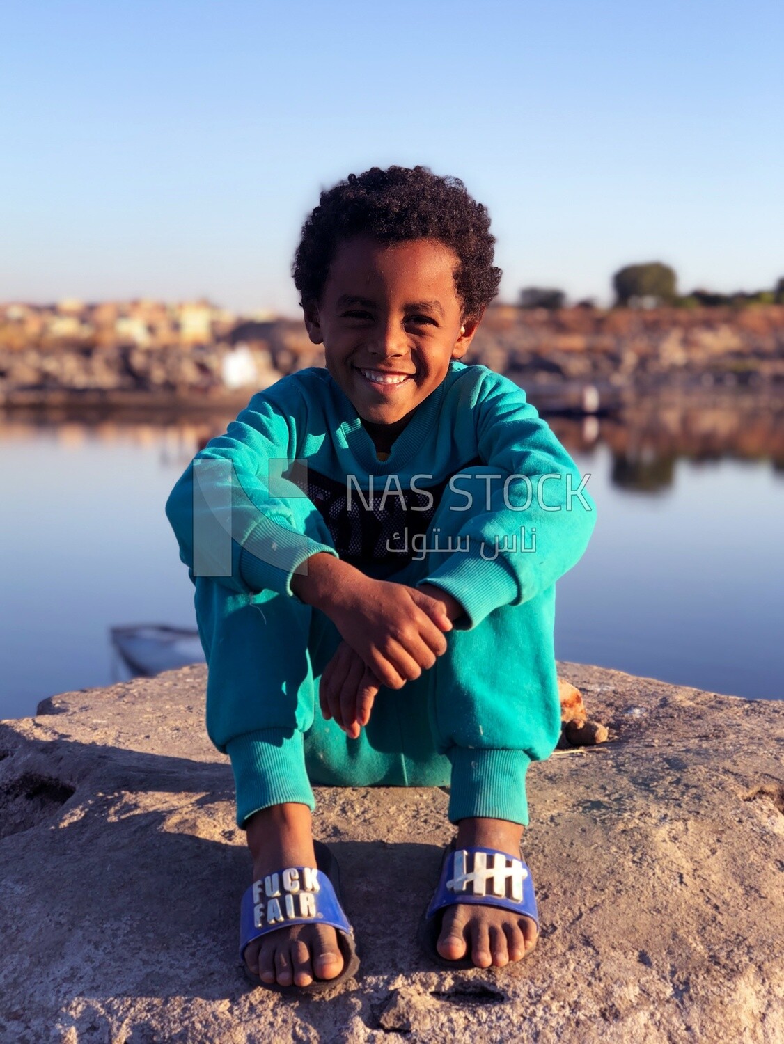 Cute Nubian child with a beautiful smile, childhood, Aswan, Egypt