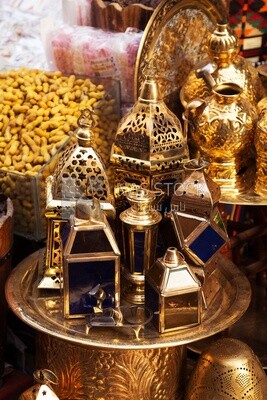 Lanterns and copper crafts displayed in a bazaar on Khan El-Khalili Street in Cairo