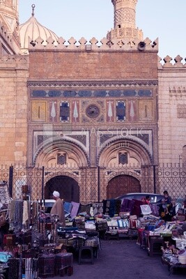 Seller displays his wares on the street next to Al-Azhar Al-Sharif Mosque in Cairo, Egypt