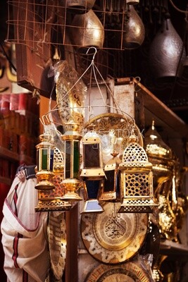 Lanterns and copper crafts displayed in a bazaar on Khan El-Khalili Street in Cairo