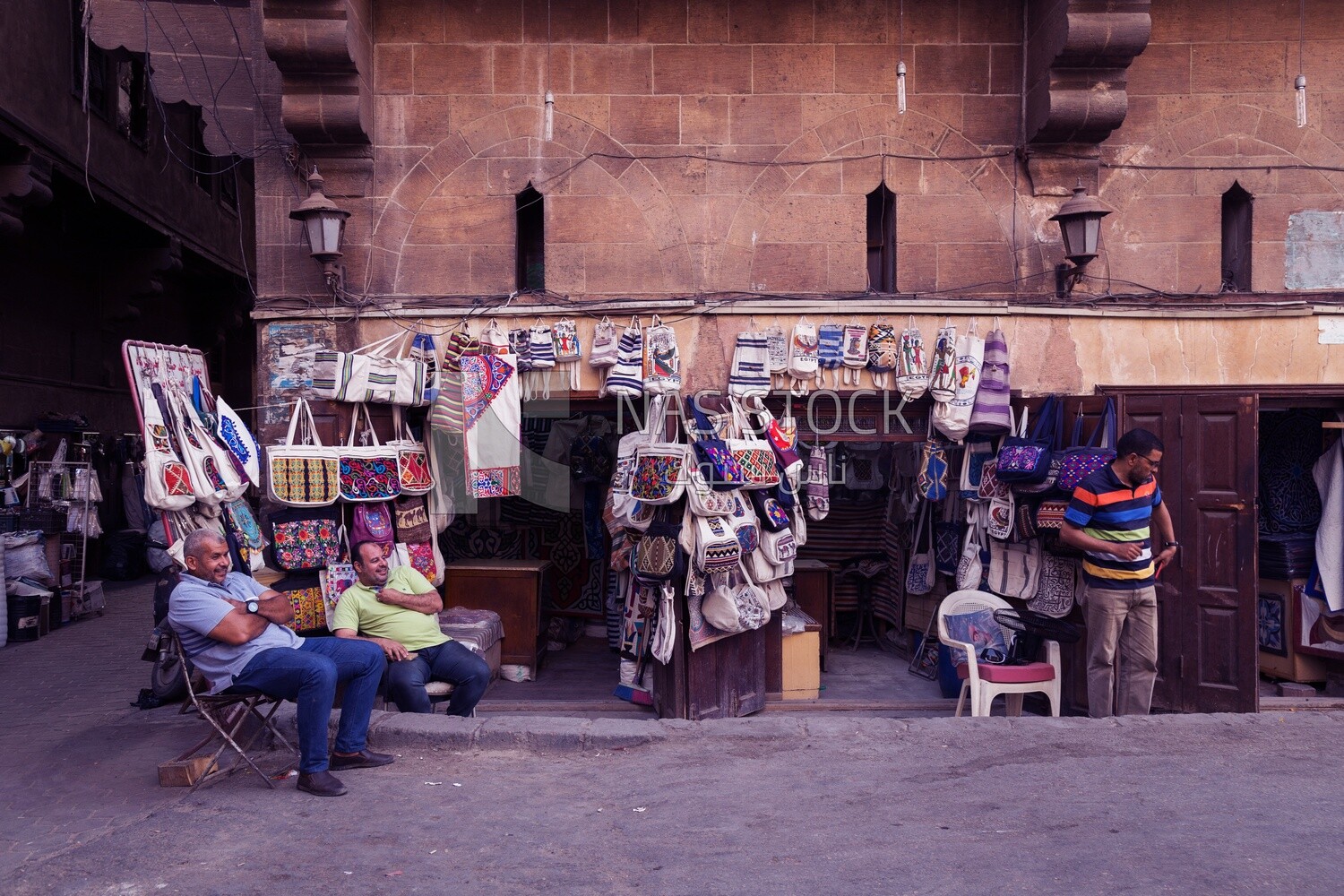 Egyptian men sitting in a store for Khayameya products