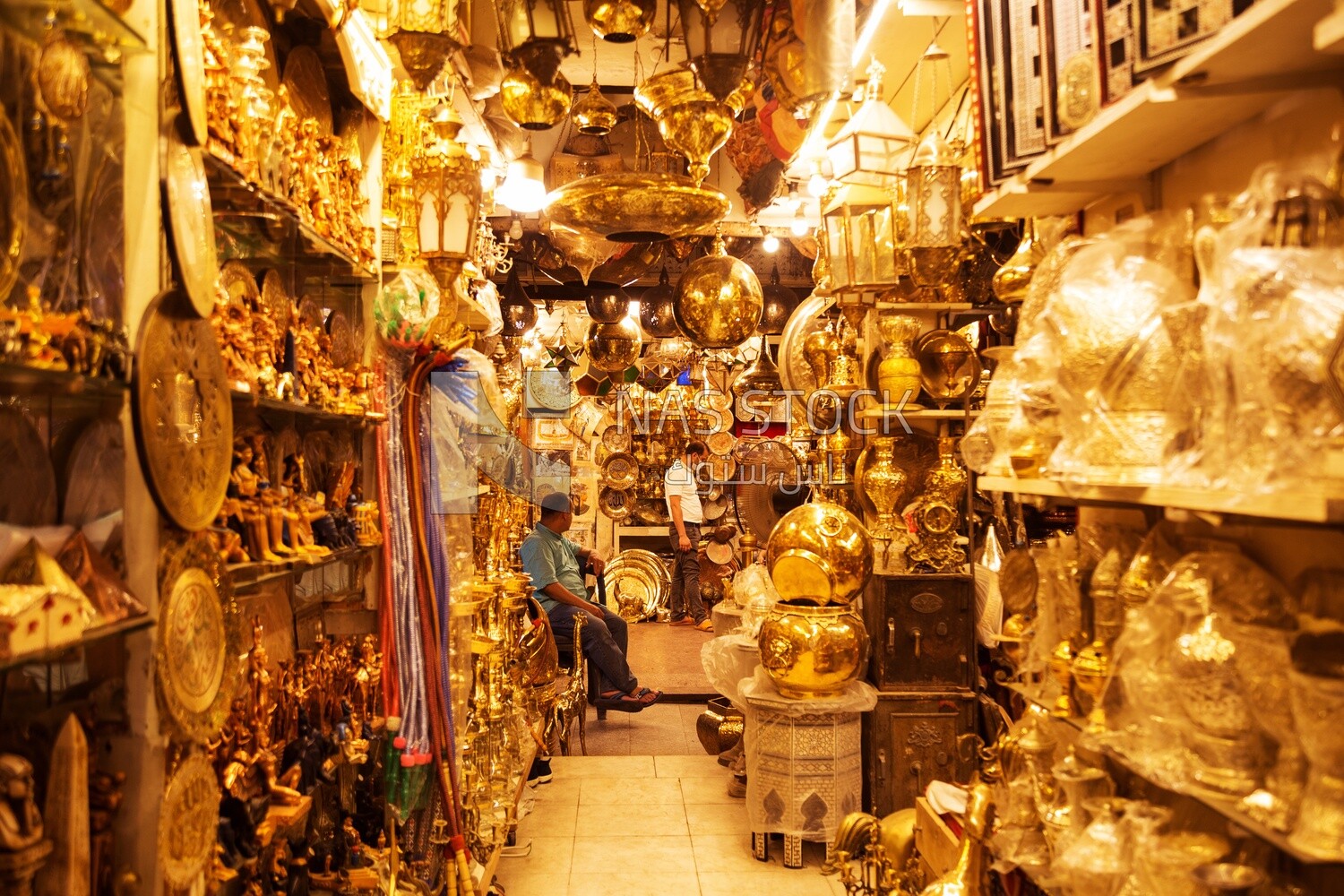 Shop selling ornate gold pots and vases