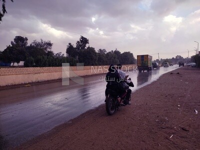 One of the streets with cars and bikes moving, Egypt