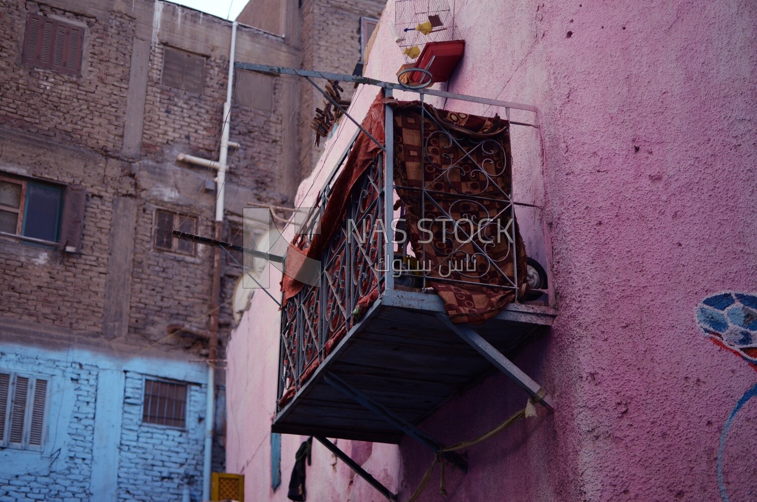 Old-fashioned hanging balcony in one of the popular neighborhoods in Cairo, Egypt