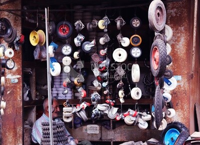 Sliding wheels hang in front of the shop