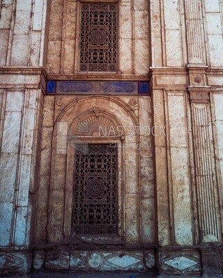 Traditional Arabic decorate window with ornaments outside a mosque in Cairo