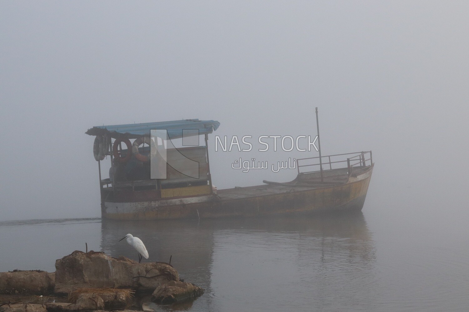 Boat sailing in the lake during the foggy weather, foggy weather
