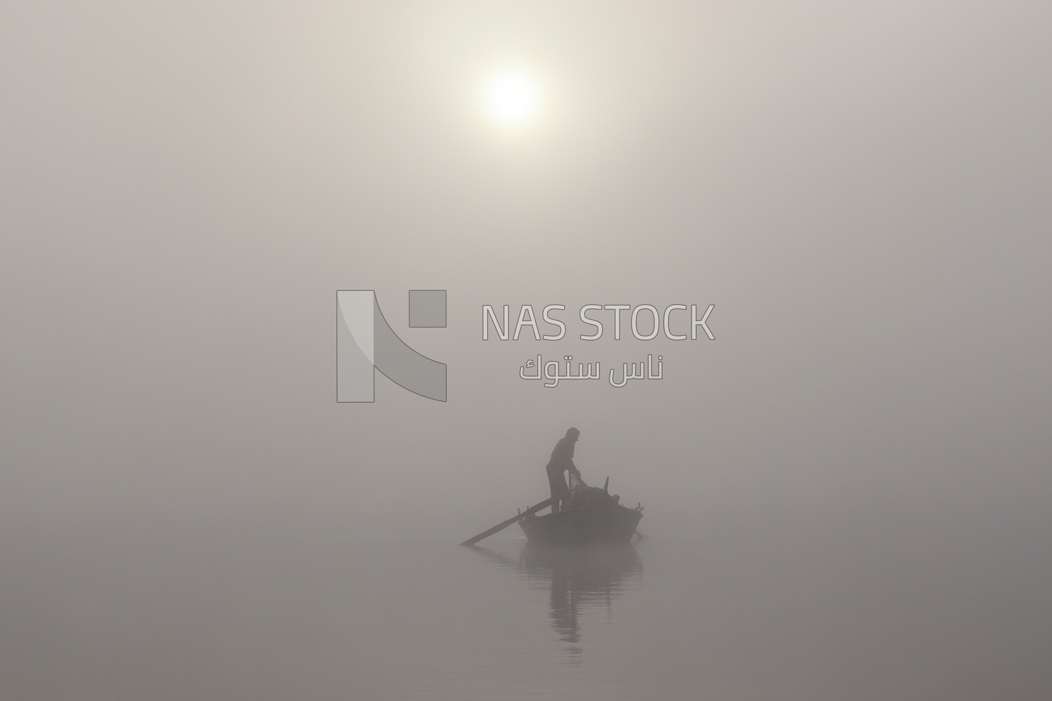 Man on a boat fishing in the middle of the sea during foggy weather, foggy weather