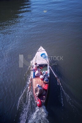 Top view of a boat sailing in the river