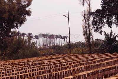 View of brick factory in front of the river, brick industry