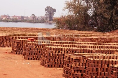 View of brick factory in front of the river, brick industry